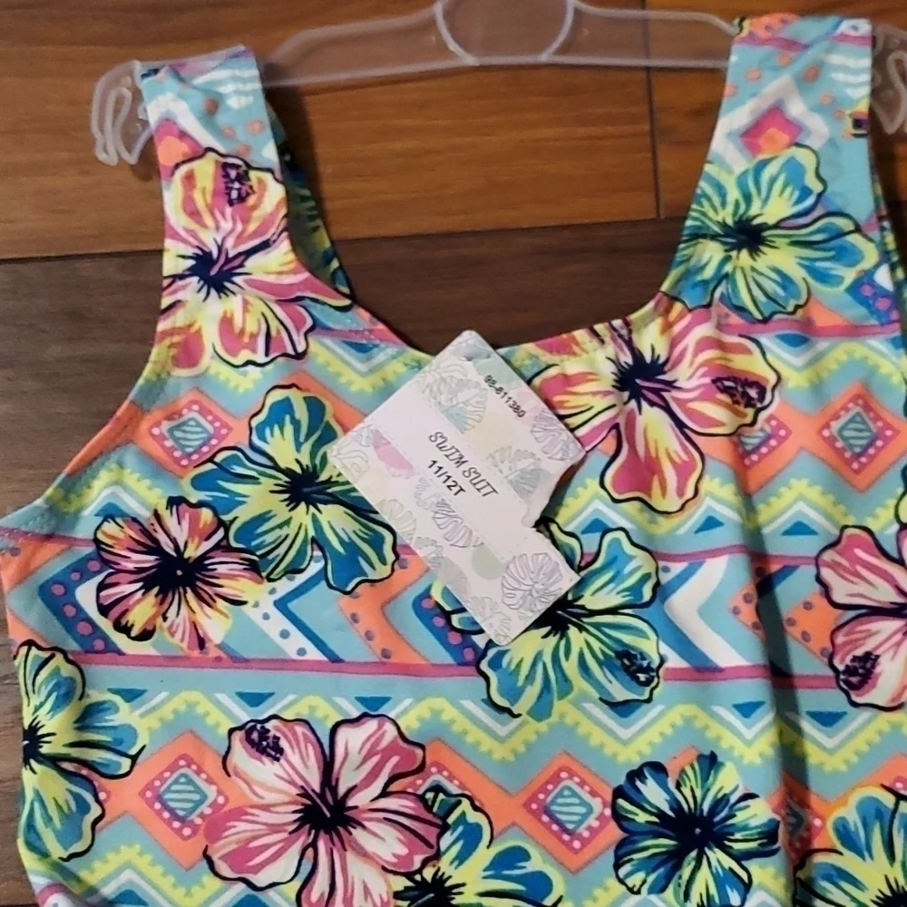 Girls new Hawaiian print one piece swim suit size 11T
